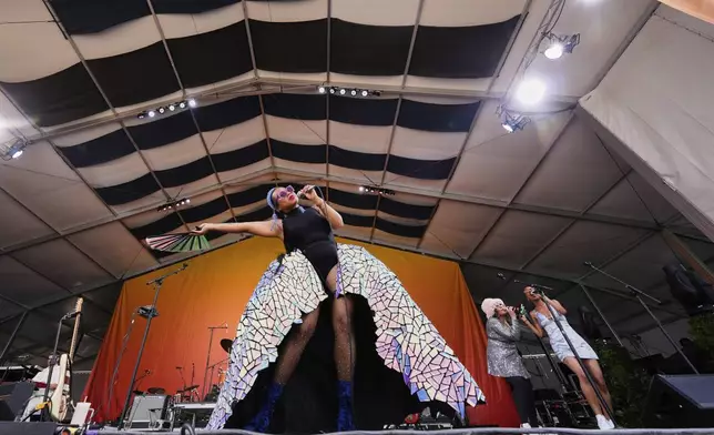 A.J. Haynes, lead singer for The Seratones, performs with the band at the New Orleans Jazz &amp; Heritage Festival in New Orleans, Friday, April 25, 2025. (AP Photo/Gerald Herbert)