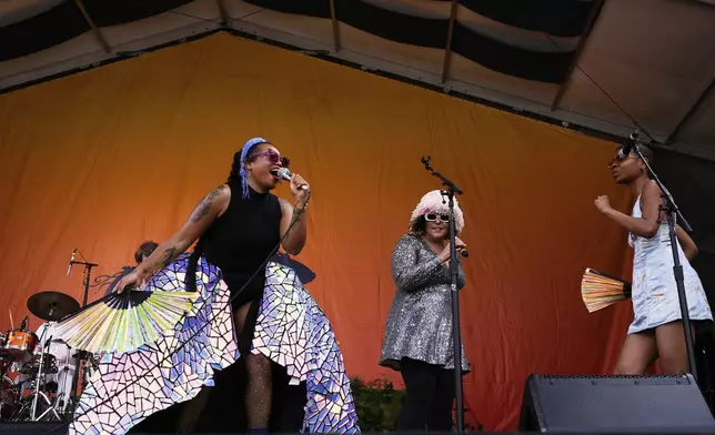 A.J. Haynes, lead singer for The Seratones, performs with the band at the New Orleans Jazz &amp; Heritage Festival in New Orleans, Friday, April 25, 2025. (AP Photo/Gerald Herbert)