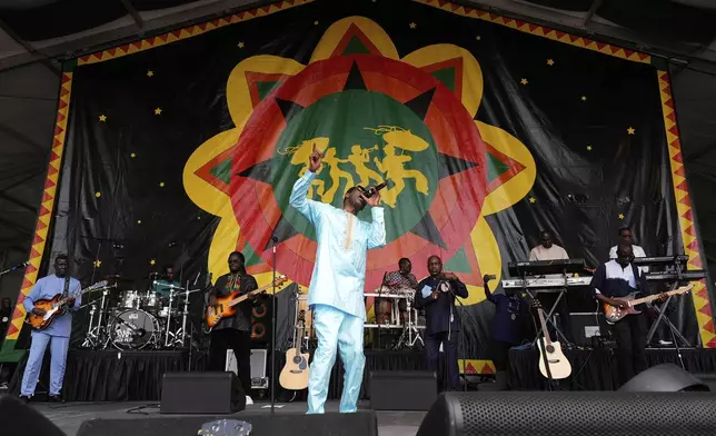 Youssou N'Dour performs at the New Orleans Jazz &amp; Heritage Festival in New Orleans, Friday, April 25, 2025. (AP Photo/Gerald Herbert)