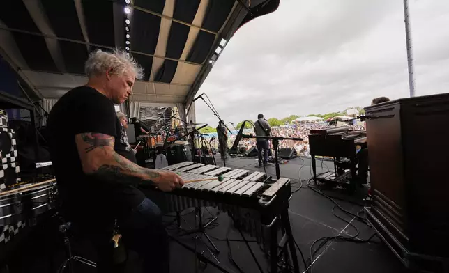 The Honey Island Swamp Band performs at the New Orleans Jazz &amp; Heritage Festival in New Orleans, Friday, April 25, 2025. (AP Photo/Gerald Herbert)
