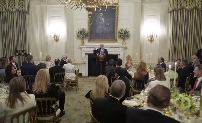 President Donald Trump speaks during a Kennedy Center board dinner in the State Dining Room at the White House, Monday, May 19, 2025, in Washington. (AP Photo/Manuel Balce Ceneta)