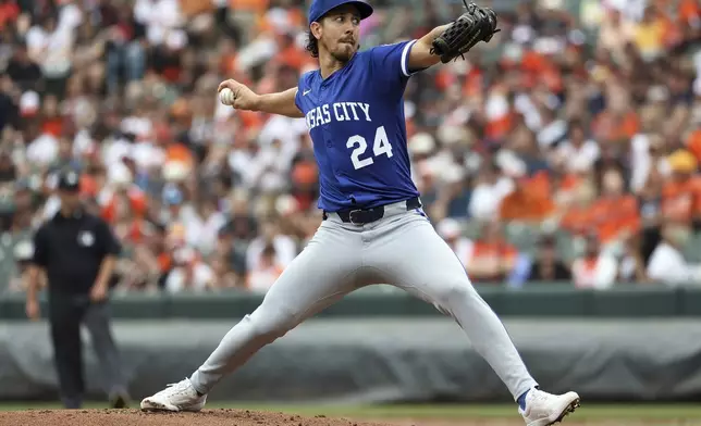 Kansas City Royals pitcher Michael Lorenzen throws the ball during the first inning of a baseball game against the Baltimore Orioles, Sunday, May, 4 2025, in Baltimore. (AP Photo/Daniel Kucin Jr.)