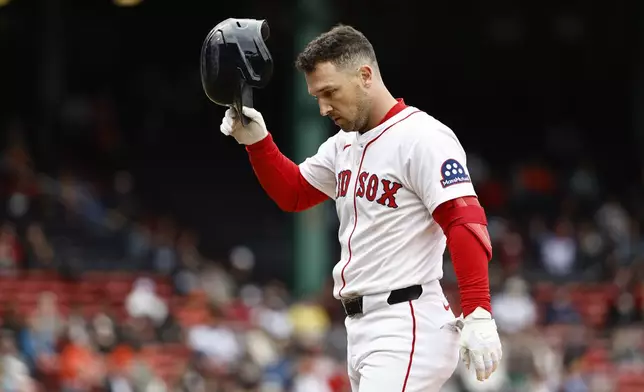 Boston Red Sox's Alex Bregman heads for the dugout after injuring himself on a single against the Baltimore Orioles during the fifth inning in the first baseball game of a doubleheader Friday, May 23, 2025, at Fenway Park in Boston. (AP Photo/Winslow Townson)