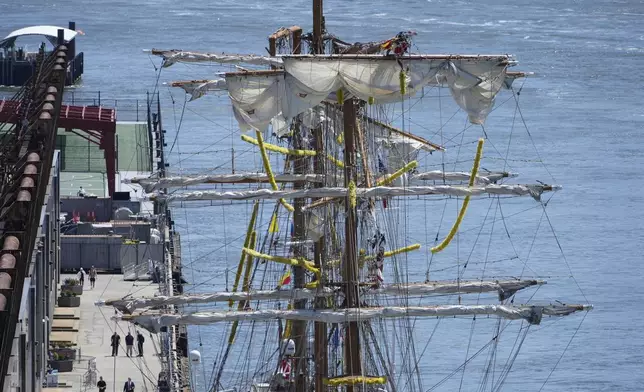 The broken masts of the Cuauhtemoc, a masted Mexican Navy training ship, is seen after it collided with the Brooklyn Bridge in New York, Monday, May 19, 2025. (AP Photo/Seth Wenig)