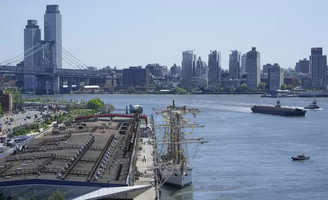 The Cuauhtemoc, a masted Mexican Navy training ship, center, is docked in Manhattan after it collided with the Brooklyn Bridge in New York, Monday, May 19, 2025. (AP Photo/Seth Wenig)