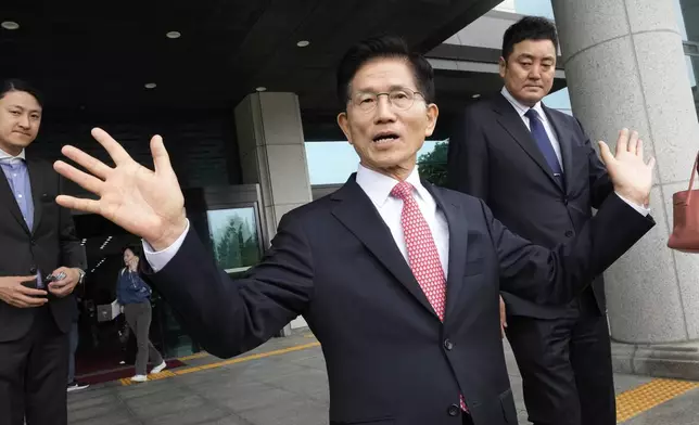South Korea's People Power Party's presidential election candidate Kim Moon Soo speaks after submitting documents to register as a candidate to run in the June 3 presidential election, at the National Election Commission, Gwacheon, South Korea, Sunday, May 11, 2025. (AP Photo/Ahn Young-joon)
