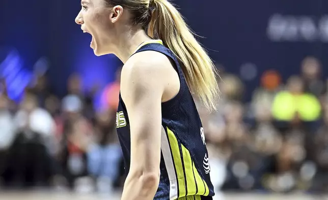Dallas Wing's Paige Bueckers reacts to a foul during a WNBA basketball game against the Connecticut Sun, Tuesday, May 27, 2025, in Uncasville, Conn. (Sarah Gordon/The Day via AP)