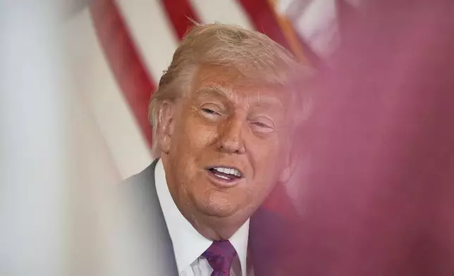 President Donald Trump speaks during a business roundtable, Thursday, May 15, 2025, in Doha, Qatar. (AP Photo/Alex Brandon)