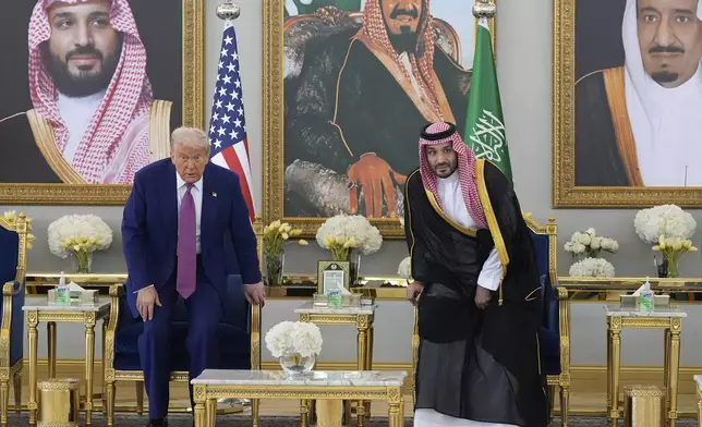 President Donald Trump arrives with Saudi Crown Prince Mohammed bin Salman for a coffee ceremony at the Royal Terminal of King Khalid International Airport in Riyadh, Saudi Arabia, Tuesday, May 13, 2025. (AP Photo/Alex Brandon)