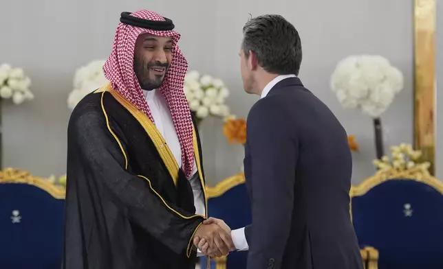 Saudi Crown Prince Mohammed bin Salman shakes hands with Secretary of State Marco Rubio during a coffee ceremony for President Donald Trump at the Royal Terminal of King Khalid International Airport in Riyadh, Saudi Arabia, Tuesday, May 13, 2025 (AP Photo/Alex Brandon)