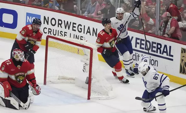 Toronto Maple Leafs left wing Max Pacioretty (67) reacts after scoring a goal against Florida Panthers goaltender Sergei Bobrovsky (72) during the third period in Game 6 of a second-round NHL hockey playoff series, Friday, May 16, 2025, in Sunrise, Fla. (AP Photo/Lynne Sladky)