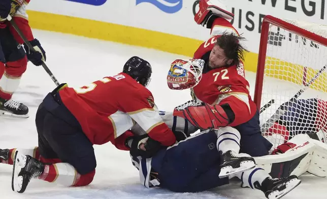 Florida Panthers goaltender Sergei Bobrovsky (72) loses his helmet during the third period in Game 6 of a second-round NHL hockey playoff series against the Toronto Maple Leafs, Friday, May 16, 2025, in Sunrise, Fla. (AP Photo/Lynne Sladky)