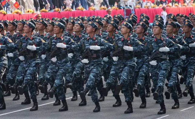 Vietnamese troops march during a parade to commemorate the 50th anniversary of the end of the Vietnam War in Ho Chi Minh City Wednesday, April 30, 2025. (AP Photo/Hau Dinh)