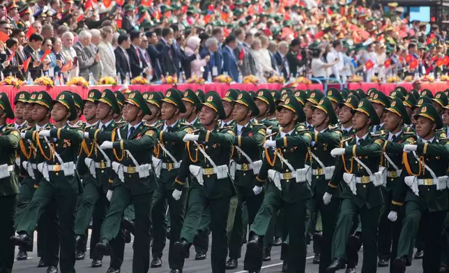 Vietnamese troops march during a parade to commemorate the 50th anniversary of the end of the Vietnam War in Ho Chi Minh City, Vietnam Wednesday, April 30, 2025. (AP Photo/Hau Dinh)
