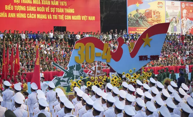 A float depicting a tank is carried in a parade celebrating the 50th anniversary of the end of the Vietnam War in Ho Chi Minh City, Vietnam, Wednesday, April 30, 2025. (AP Photo/Achmad Ibrahim)