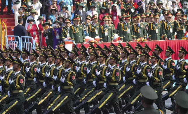 Chinese troops march during a parade to commemorate the 50th anniversary of the end of the Vietnam War in Ho Chi Minh City, Wednesday, April 30, 2025. (AP Photo/Achmad Ibrahim)
