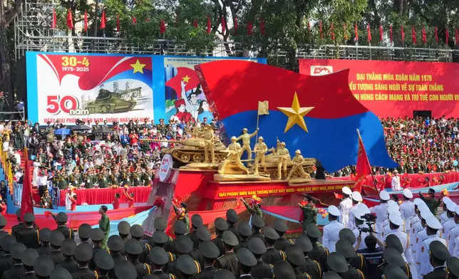 A float depicting a tank is carried in a parade celebrating the 50th anniversary of the end of the Vietnam War in Ho Chi Minh City, Vietnam, Wednesday, April 30, 2025. (AP Photo/Achmad Ibrahim)