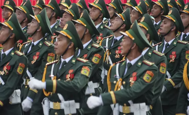 Vietnamese troops march during a parade to commemorate the 50th anniversary of the end of the Vietnam War in Ho Chi Minh City, Vietnam Wednesday, April 30, 2025. (AP Photo/Hau Dinh)