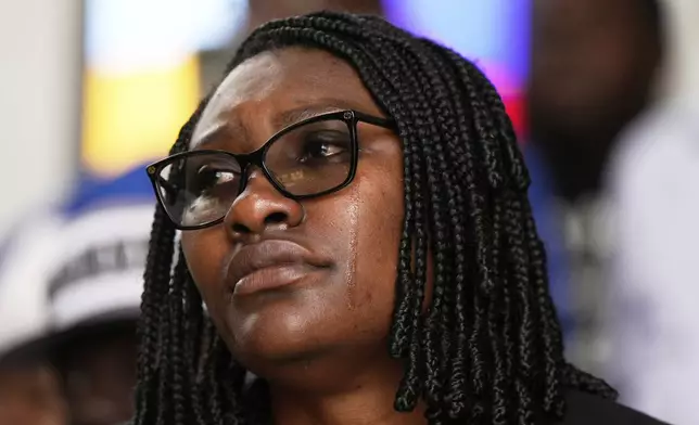 George Floyd's niece, Bianca Williams, reacts during a memorial service on the anniversary of Floyd's death on Sunday, May 25, 2025, in Houston. (AP Photo/Ashley Landis)