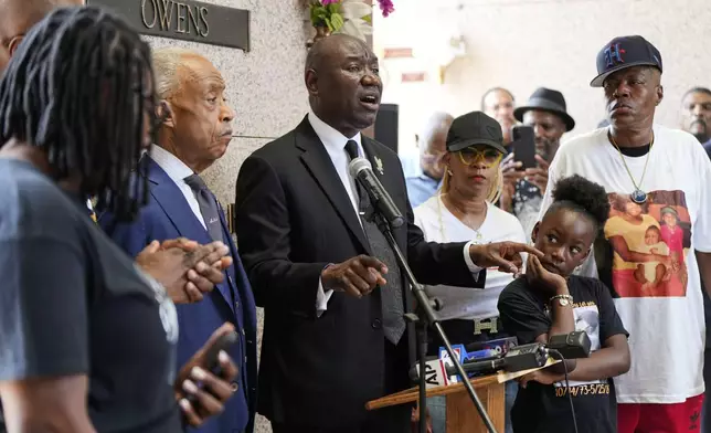 Attorney Ben Crump, center, speaks during a memorial service on the anniversary of Floyd's death on Sunday, May 25, 2025, in Houston. (AP Photo/Ashley Landis)