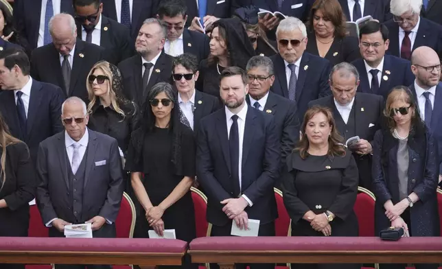 Vice President JD Vance, center, and second lady Usha Vance, center left, attend the inaugural Mass of Pope Leo XIV's pontificate in St. Peter's Square at the Vatican, Sunday, May 18, 2025. (AP Photo/Jacquelyn Martin, Pool)