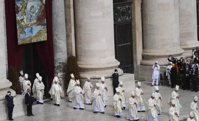 Cardinals take their places during the inaugural Mass of Pope Leo XIV's pontificate in St. Peter's Square at the Vatican, Sunday, May 18, 2025. (AP Photo/Jacquelyn Martin, Pool)