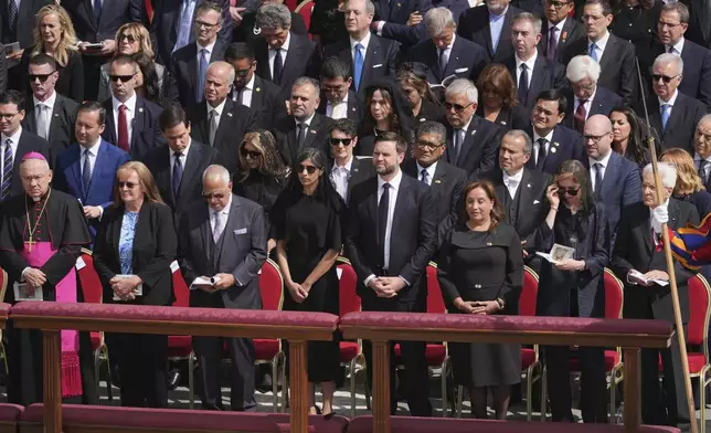 Vice President JD Vance, center right, and his wife Usha Vance, center left, attend the inaugural Mass of Pope Leo XIV's pontificate in St. Peter's Square at the Vatican, Sunday, May 18, 2025. (AP Photo/Jacquelyn Martin, Pool)