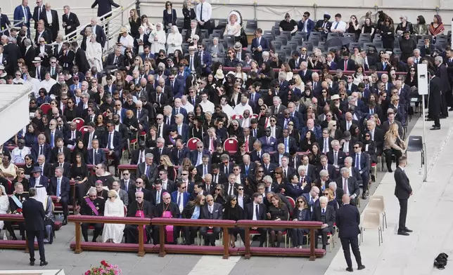 Guests and dignitaries attend the inaugural Mass of Pope Leo XIV's pontificate in St. Peter's Square at the Vatican, Sunday, May 18, 2025. (AP Photo/Jacquelyn Martin, Pool)