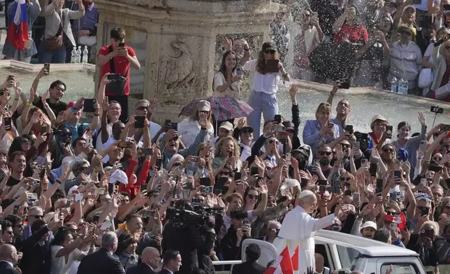 Pope Leo XIV on his popemobile tours St. Peter's Square at the Vatican prior to the inaugural Mass of his pontifcate, Sunday, May 18, 2025. (AP Photo/Jacquelyn Martin, Pool)