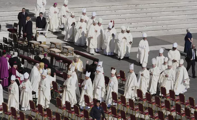 Clergy members attend the inaugural Mass of Pope Leo XIV's pontificate in St. Peter's Square at the Vatican, Sunday, May 18, 2025. (AP Photo/Jacquelyn Martin, Pool)