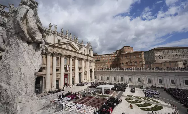 Guests and dignitaries attend the inaugural Mass of Pope Leo XIV's pontificate in St. Peter's Square at the Vatican, Sunday, May 18, 2025. (AP Photo/Jacquelyn Martin, Pool)