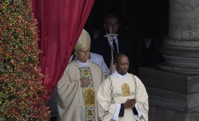 Pope Leo XIV arrives for the inauguration of his pontificate with a Mass in St. Peter's Square attended by heads of state, royalty and ordinary faithful, Sunday, May 18, 2025. (AP Photo/Gregorio Borgia)