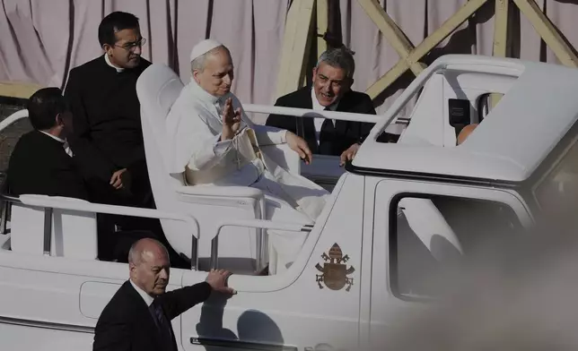 Pope Leo XIV on his popemobile tours St. Peter's Square at the Vatican prior to the inaugural Mass of his pontificate, Sunday, May 18, 2025. (AP Photo/Jacquelyn Martin, Pool)