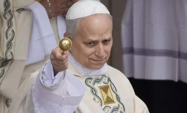 Pope Leo XIV celebrates a Mass for the formal inauguration of his pontificate, in St. Peter's Square attended by heads of state, royalty and ordinary faithful, Sunday, May 18, 2025. (AP Photo/Gregorio Borgia)