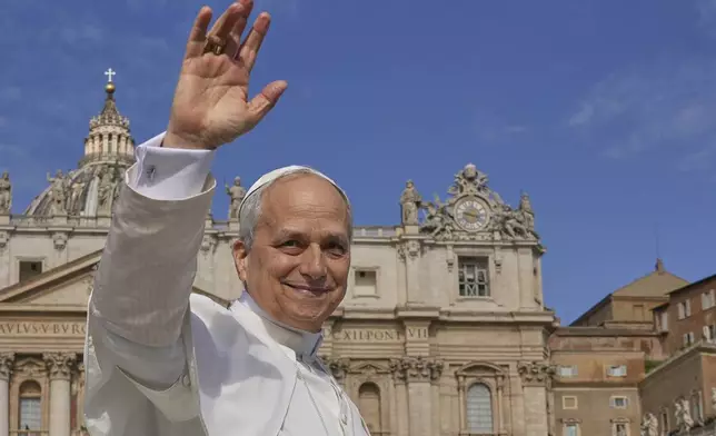 Pope Leo XIV on his popemobile tours St. Peter's Square at the Vatican prior to the inaugural Mass of his pontificate, Sunday, May 18, 2025. (AP Photo/Andrew Medichini)