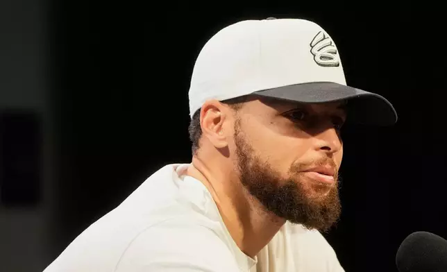 Golden State Warriors guard Stephen Curry speaks during a news conference at the NBA basketball team's facility in San Francisco, Thursday, May 15, 2025. (AP Photo/Jeff Chiu)