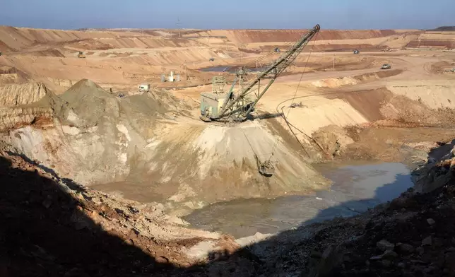 FILE - An ilmenite open pit mine is seen in a canyon in the central region of Kirovohrad, Ukraine, Feb. 12, 2025. (AP Photo/Efrem Lukatsky, File)