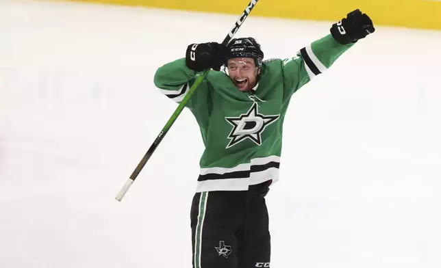 Dallas Stars' Thomas Harley celebrates after scoring in overtime in Game 6 of a second-round NHL hockey playoff series against the Winnipeg Jets in Dallas, Saturday, May 17, 2025. (AP Photo/Gareth Patterson)