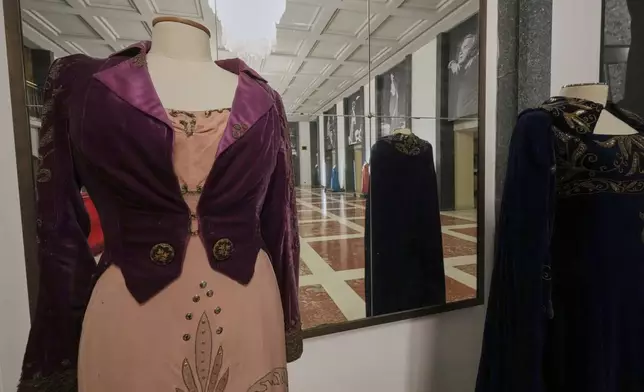 Historical costumes from Giacomo Puccini's "Tosca" opera are on display inside the foyer of the "Teatro dell' Opera" opera house, in Rome, Thursday, April 10, 2025. (AP Photo/Andrew Medichini)