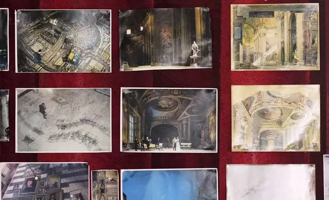 Photos of projects and stage canvases used for previous performances of Giacomo Puccini's "Tosca" opera are hang on a wall of the "Teatro dell' Opera" opera house warehouse, in Rome, Thursday, April 10, 2025. (AP Photo/Andrew Medichini)