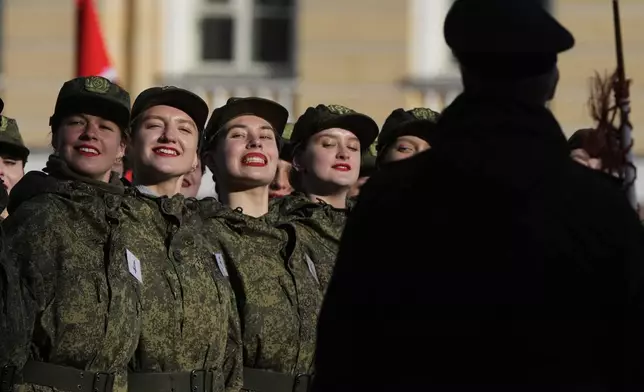 Russian soldiers attend a rehearsal for the Victory Day military parade at the Dvortsovaya (Palace) Square in St. Petersburg, Russia, Wednesday, April 30, 2025. (AP Photo/Dmitri Lovetsky)