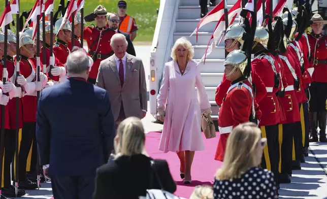 King Charles and Queen Camilla arrive at the Ottawa International Airport in Ottawa, Canada, for a royal visit on Monday, May 26, 2025. (Sean Kilpatrick/The Canadian Press via AP)