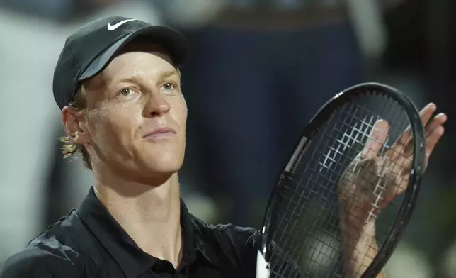 Italy's Jannik Sinner celebrates after a second round match against Argentina's Mariano Navone at the Italian Open tennis tournament in Rome, Saturday, May 10, 2025. (AP Photo/Andrew Medichini)