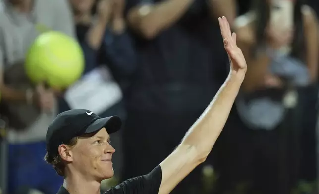 Italy's Jannik Sinner celebrates after a second round match against Argentina's Mariano Navone at the Italian Open tennis tournament in Rome, Saturday, May 10, 2025. (AP Photo/Andrew Medichini)