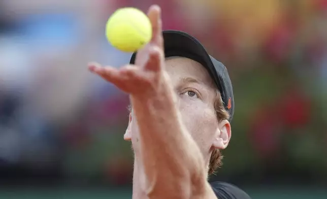 Italy's Jannik Sinner serves against Argentina's Mariano Navone during their second round match at the Italian Open tennis tournament in Rome, Saturday, May 10, 2025. (AP Photo/Andrew Medichini)