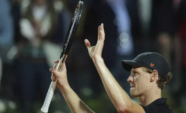 Italy's Jannik Sinner celebrates after a second round match against Argentina's Mariano Navone at the Italian Open tennis tournament in Rome, Saturday, May 10, 2025. (AP Photo/Andrew Medichini)