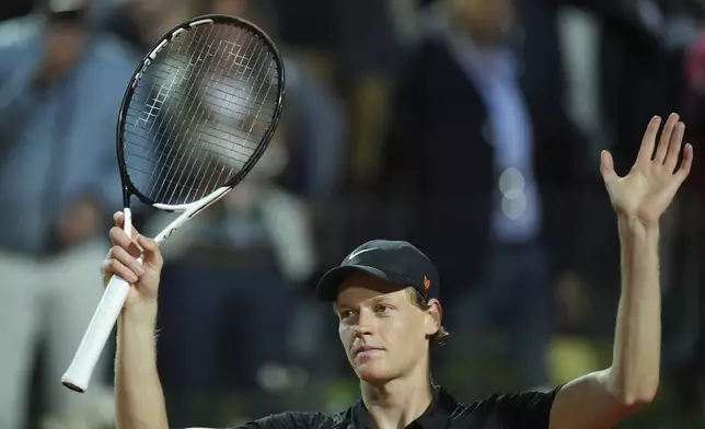 Italy's Jannik Sinner celebrates after a second round match against Argentina's Mariano Navone at the Italian Open tennis tournament in Rome, Saturday, May 10, 2025. (AP Photo/Andrew Medichini)