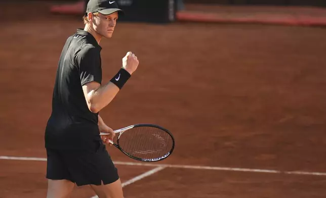 Italy's Jannik Sinner reacts after winning a point to Netherlands' Jesper De Jong during their tennis match at the Italian Open at the Foro Italico, in Rome, Monday, May 12, 2025.