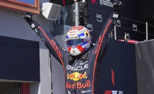 Red Bull driver Max Verstappen of the Netherlands celebrates winning the Italy's Emilia Romagna Formula One Grand Prix, in Imola, Italy, Sunday, May 18, 2025. (AP Photo/Antonio Calanni)