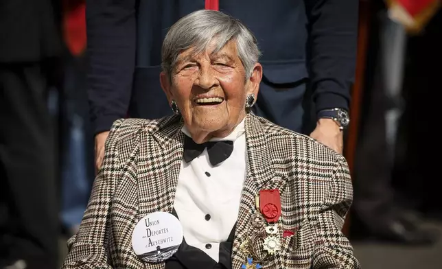 Holocaust survivor Ginette Kolinka ,100, attends a commemorative ceremony to mark the 80th anniversary of the return of the deportees, in Paris, France, Sunday, April 27, 2025. (AP Photo/Thomas Padilla)